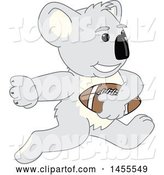 Vector Illustration of a Cartoon Koala Bear Mascot Running with a Football by Mascot Junction