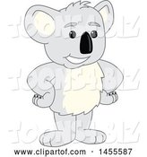 Vector Illustration of a Cartoon Koala Bear Mascot Standing with Hands on Hips by Mascot Junction