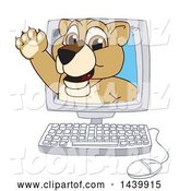 Vector Illustration of a Cartoon Lion Cub School Mascot Emerging from a Computer Screen by Mascot Junction