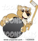 Vector Illustration of a Cartoon Lion Cub School Mascot Grabbing a Hockey Puck and Holding a Stick by Mascot Junction