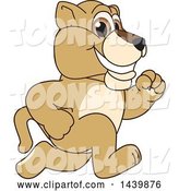 Vector Illustration of a Cartoon Lion Cub School Mascot Running by Mascot Junction