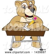 Vector Illustration of a Cartoon Lion Cub School Mascot Taking a Quiz by Mascot Junction