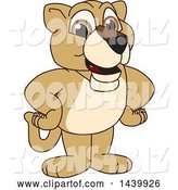 Vector Illustration of a Cartoon Lion Cub School Mascot with His Hands on His Hips by Toons4Biz