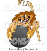 Vector Illustration of a Cartoon Lion Mascot Grabbing a Hockey Puck by Mascot Junction