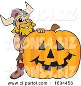 Vector Illustration of a Cartoon Male Viking School Mascot with a Halloween Pumpkin by Mascot Junction