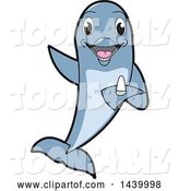 Vector Illustration of a Cartoon Porpoise Dolphin School Mascot Holding a Tooth by Mascot Junction