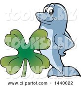 Vector Illustration of a Cartoon Porpoise Dolphin School Mascot with a St Patricks Day Clover by Mascot Junction