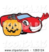 Vector Illustration of a Cartoon Red Convertible Car Mascot Waving by a Halloween Jackolantern Pumpkin by Mascot Junction