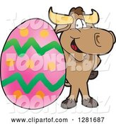 Vector Illustration of a Cartoon School Bull Mascot Standing with a Giant Easter Egg by Mascot Junction