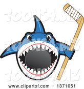 Vector Illustration of a Cartoon Shark School Mascot Biting a Hockey Puck and Holding a Stick by Mascot Junction