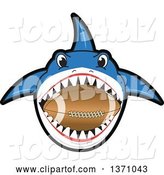 Vector Illustration of a Cartoon Shark School Mascot Biting an American Football by Mascot Junction