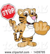 Vector Illustration of a Cartoon Tiger Cub Mascot Holding a Stop Sign by Mascot Junction