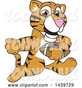 Vector Illustration of a Cartoon Tiger Cub Mascot Playing Football by Mascot Junction