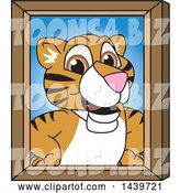 Vector Illustration of a Cartoon Tiger Cub Mascot Portrait by Mascot Junction