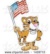 Vector Illustration of a Cartoon Tiger Cub Mascot Waving an American Flag by Mascot Junction