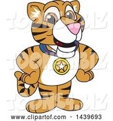 Vector Illustration of a Cartoon Tiger Cub Mascot Wearing a Sports Medal by Mascot Junction