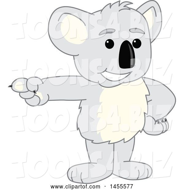 Vector Illustration of a Cartoon Koala Bear Mascot Pointing