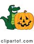 Vector Illustration of a Cartoon Alligator Mascot with a Halloween Jackolantern Pumpkin by Mascot Junction
