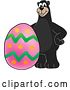 Vector Illustration of a Cartoon Black Bear School Mascot with an Easter Egg by Mascot Junction