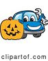 Vector Illustration of a Cartoon Blue Car Mascot Holding a Wrench by a Halloween Jackolantern Pumpkin by Mascot Junction