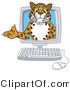 Vector Illustration of a Cartoon Cheetah Mascot in a Computer by Mascot Junction