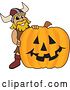 Vector Illustration of a Cartoon Male Viking School Mascot with a Halloween Pumpkin by Mascot Junction