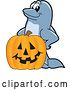 Vector Illustration of a Cartoon Porpoise Dolphin School Mascot with a Halloween Jackolantern Pumpkin by Toons4Biz