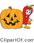Vector Illustration of a Red Hot Chili Pepper Mascot Standing with a Carved Halloween Pumpkin by Mascot Junction